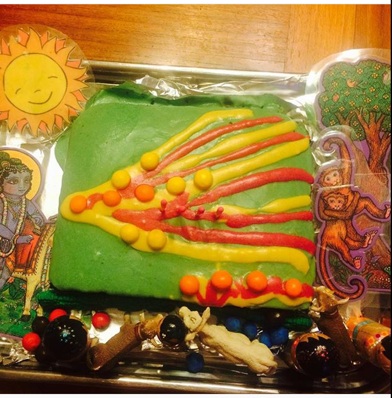 Krishna-cake-Krsna-swallows-forest-fire