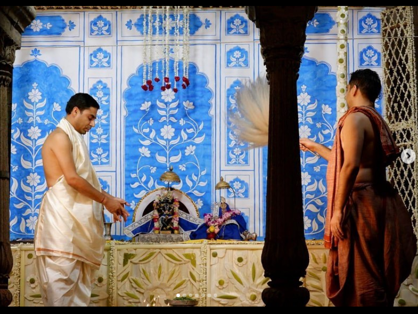 blue mughal style altar background for krishna diety festival shri radhraman murti on blue backdrop