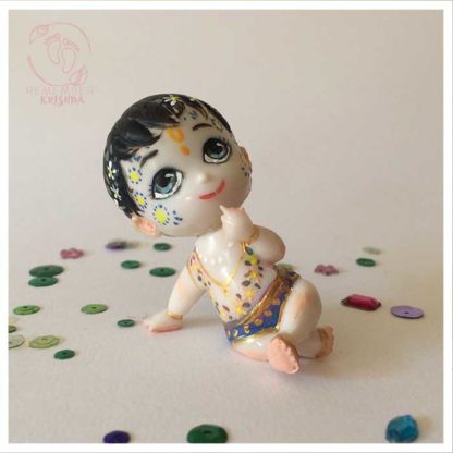 Balaram white painted plastic doll easy and cute give for vedic children