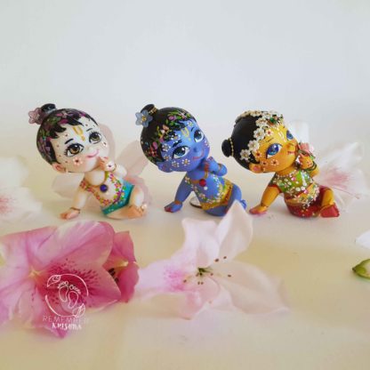 set of krishna radha and balaram dolls for children. dolls are very cute with peacock feather and decorations