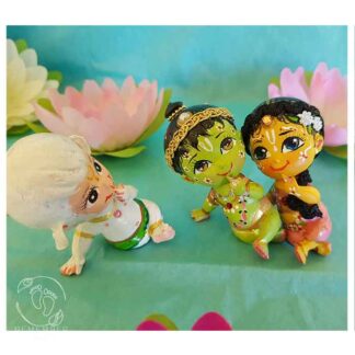 sita sits close to Rama and hanuman looks at them admiringly