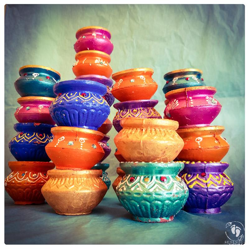 butterpots gaily painted decorated with jewels minature butter pots for Krsna and balaram multi color indian diwali