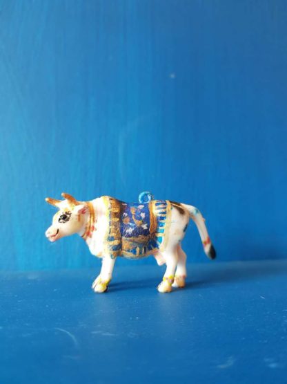 small cow pendant surabhi cow with blue blanket