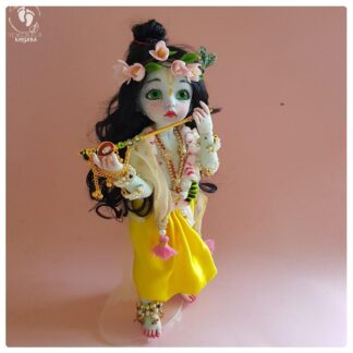 poseable bjd krishna doll holding flute decorated with peacock feathers perfect doll for play