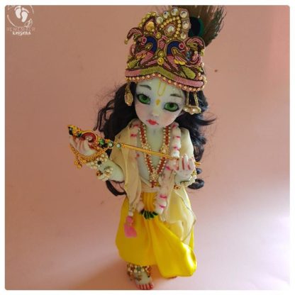 poseable bjd krishna doll holding flute decorated with peacock feathers perfect doll for play
