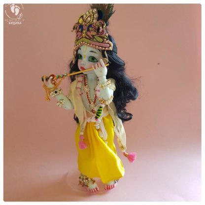 poseable bjd krishna doll holding flute decorated with peacock feathers perfect doll for play