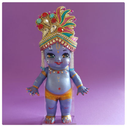 sweet blue krishna dolls wears holi colors crowns
