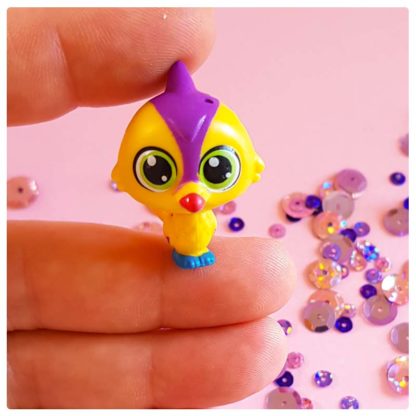 Pretty little yellow and purple parrot bird animal doll friend of krsna with a swivel head.
