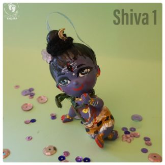 Lord Shiva Rudra doll sitting with all ornaments, snake at neck crescent moon and ganga in hair wearing a tigerskin