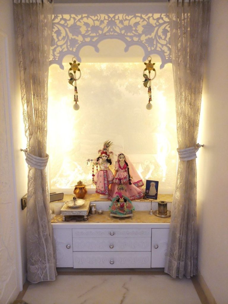 home deity worship altar with small curtains radha krishna