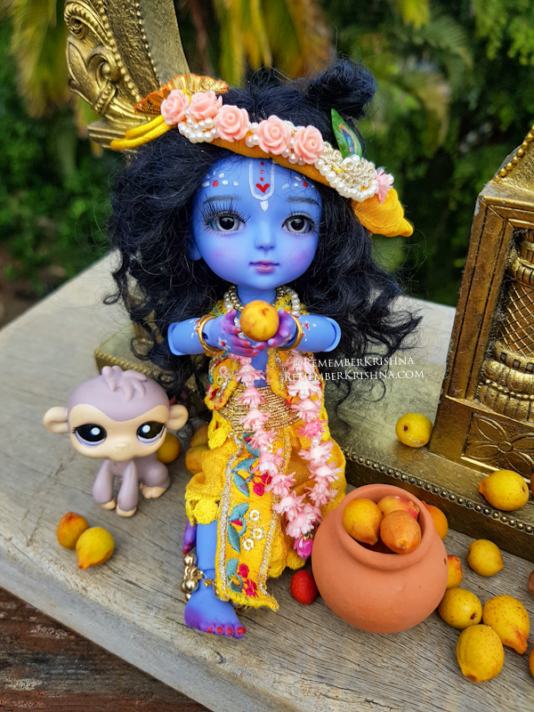 poseable krishna doll with frut and monkey