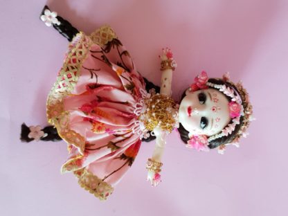 Shri Radha doll with gorgeous braids and flower crown poseable radha doll flatlay