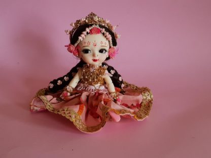 Shri Radha doll with gorgeous braids and flower crown poseable radha doll sitting pose