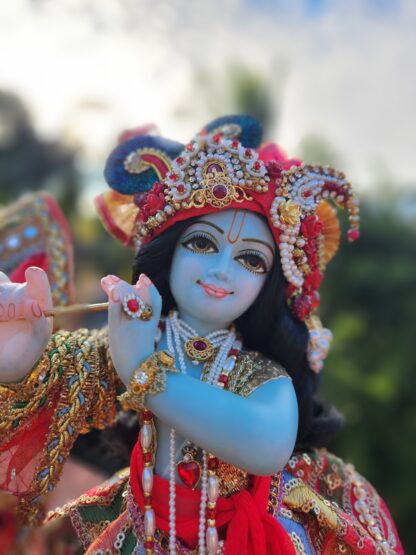 Krishna deity wearing turban with heavy ornate jewellery