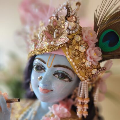 Exclusive Marble deities Radha and Krishna hand carved from marble dressed in yellow shringar and delicately adorned with flower and pearl jewelery