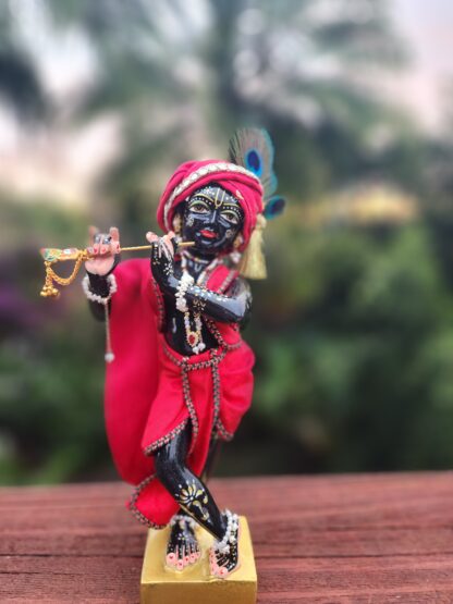 black krishna deity carved marble 10 inch tall murti wearing red shringar