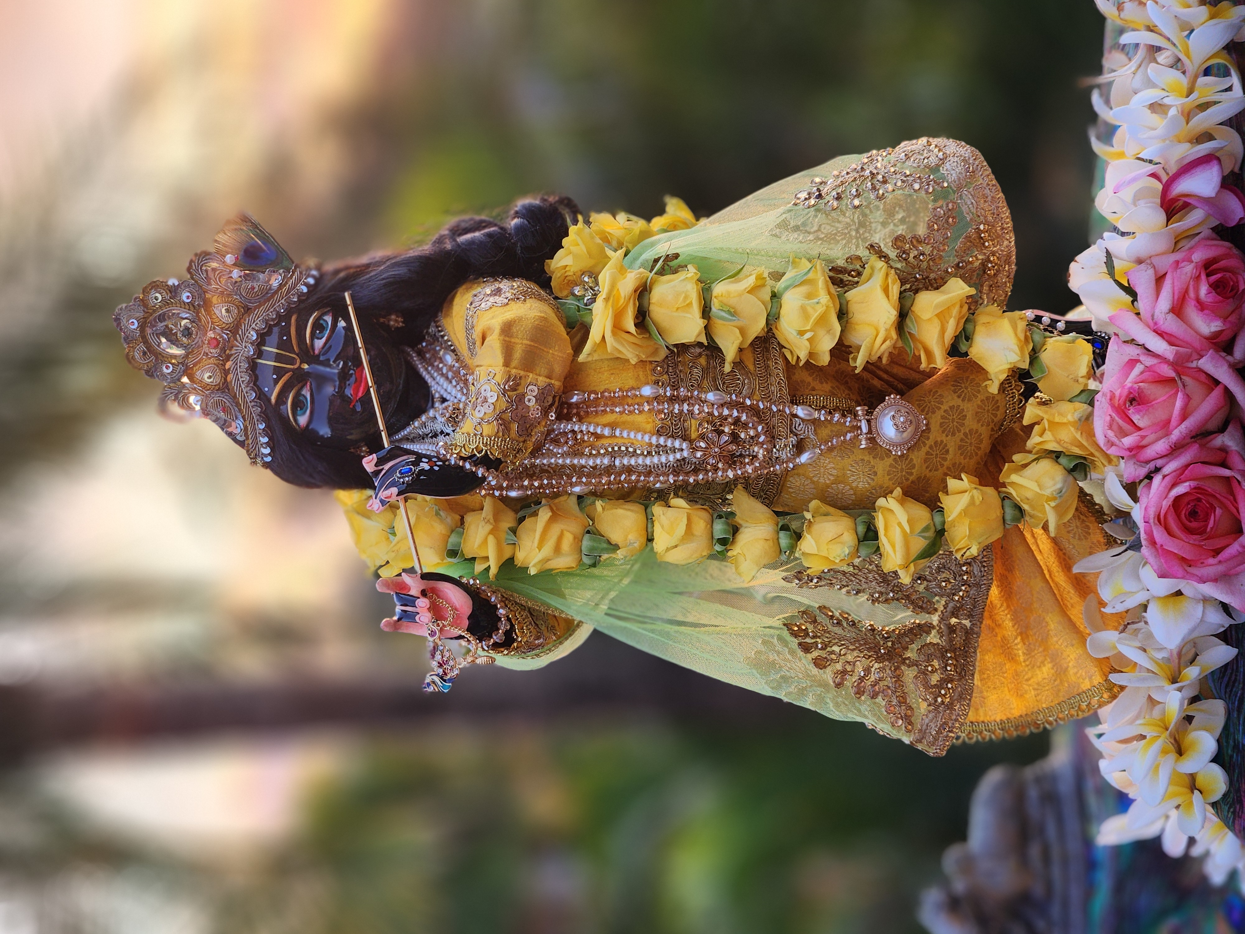 Syamasundar Krishna vigraha wearing golden pitambar yellow Janmastami outfit